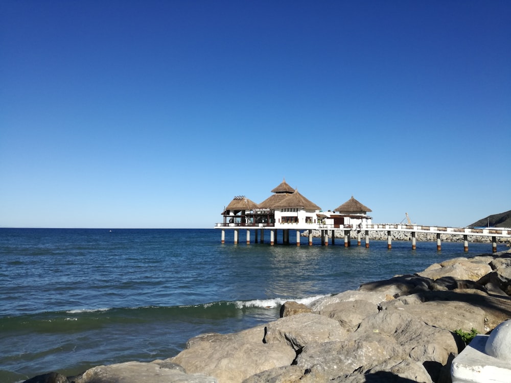 a pier that is next to a body of water