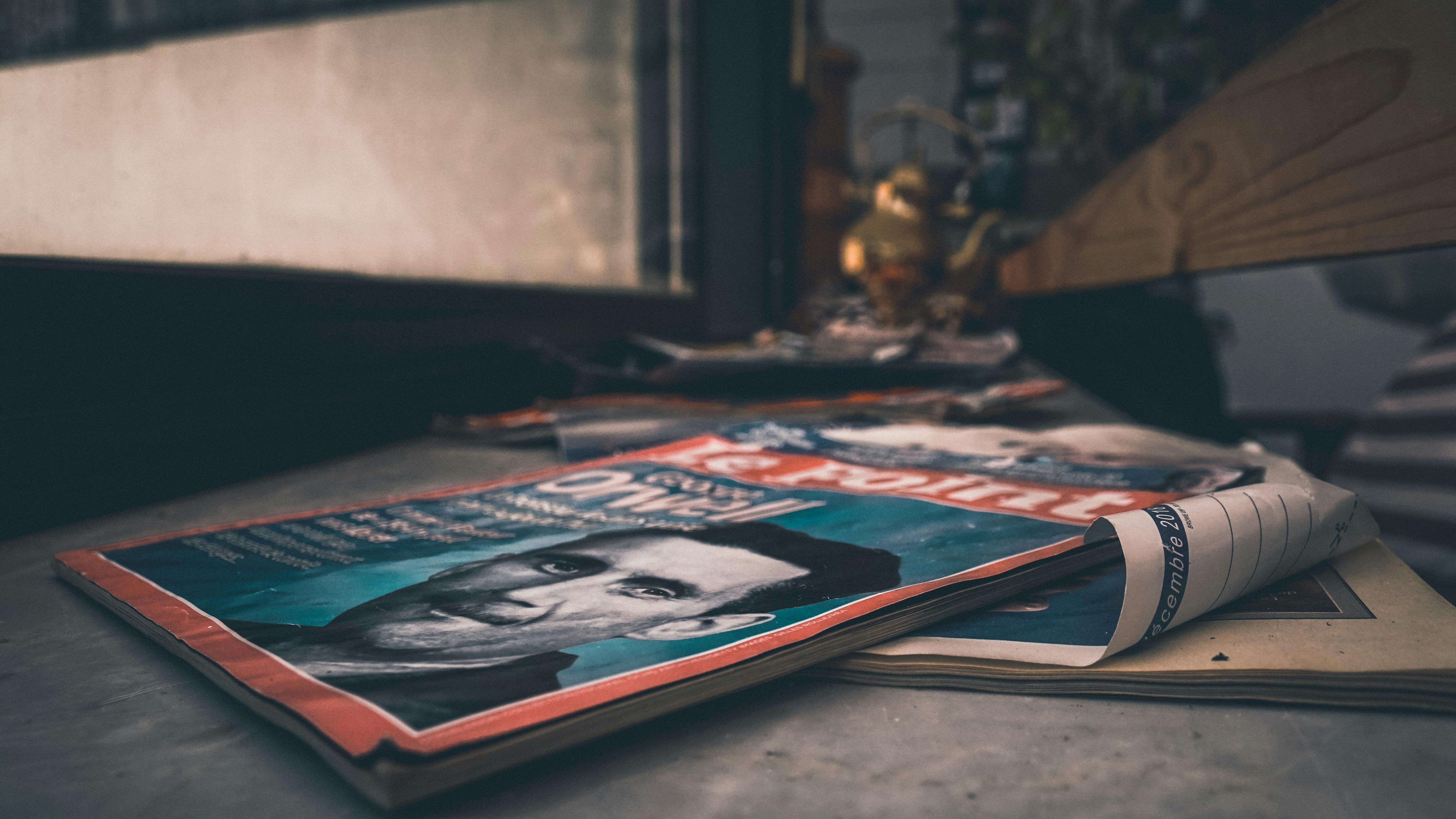 magazine on grey surface