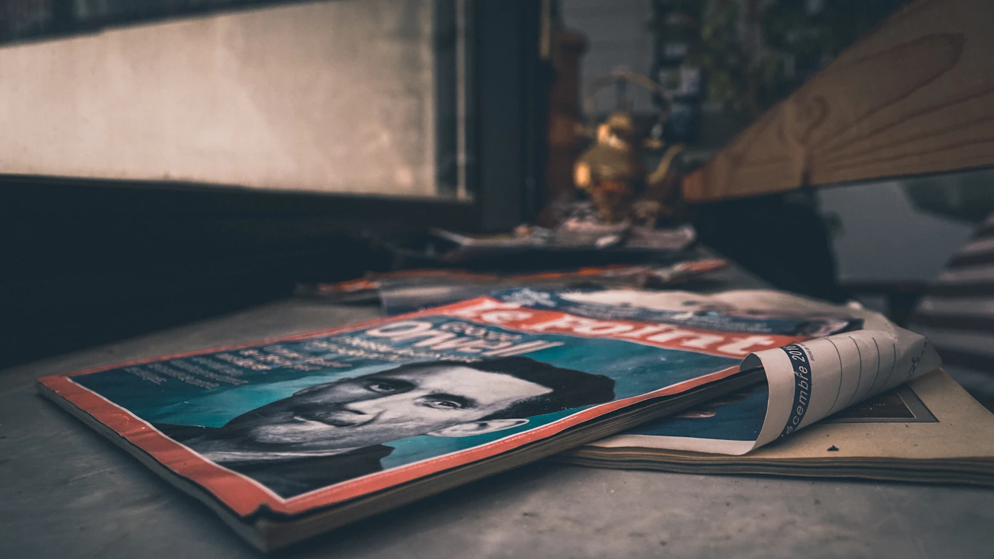 Magazine on grey surface