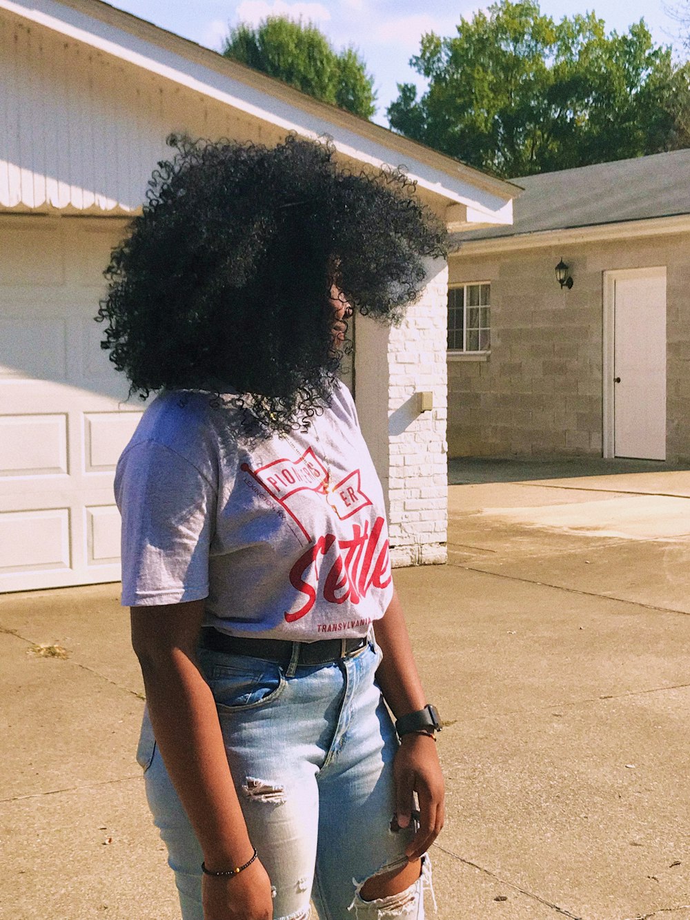 woman in shirt and jeans