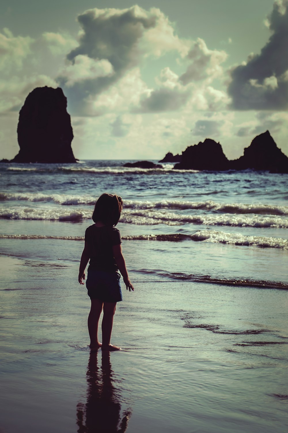girl standing on seashore