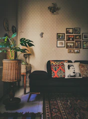 Cozy living area with comfortable sofa and vibrant artwork.