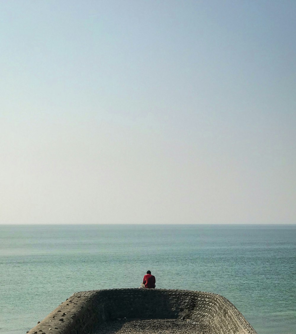 calm sea under clear blue sky