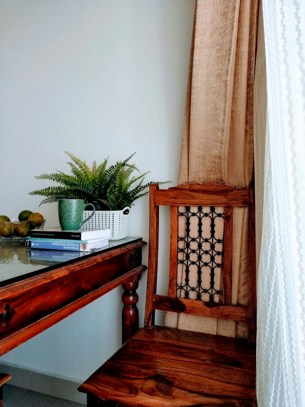 brown wooden chair beside a table