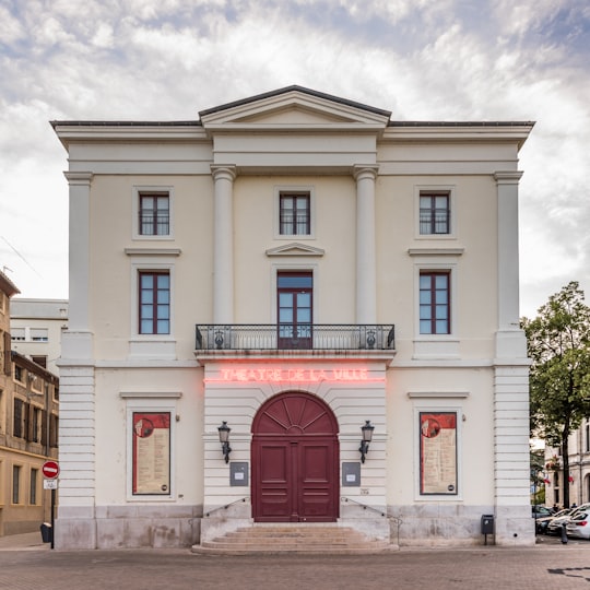 white concrete building under white skies during daytime in Valence France