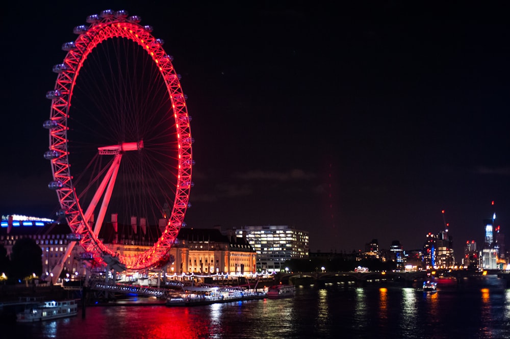 London Eye near sea during night time