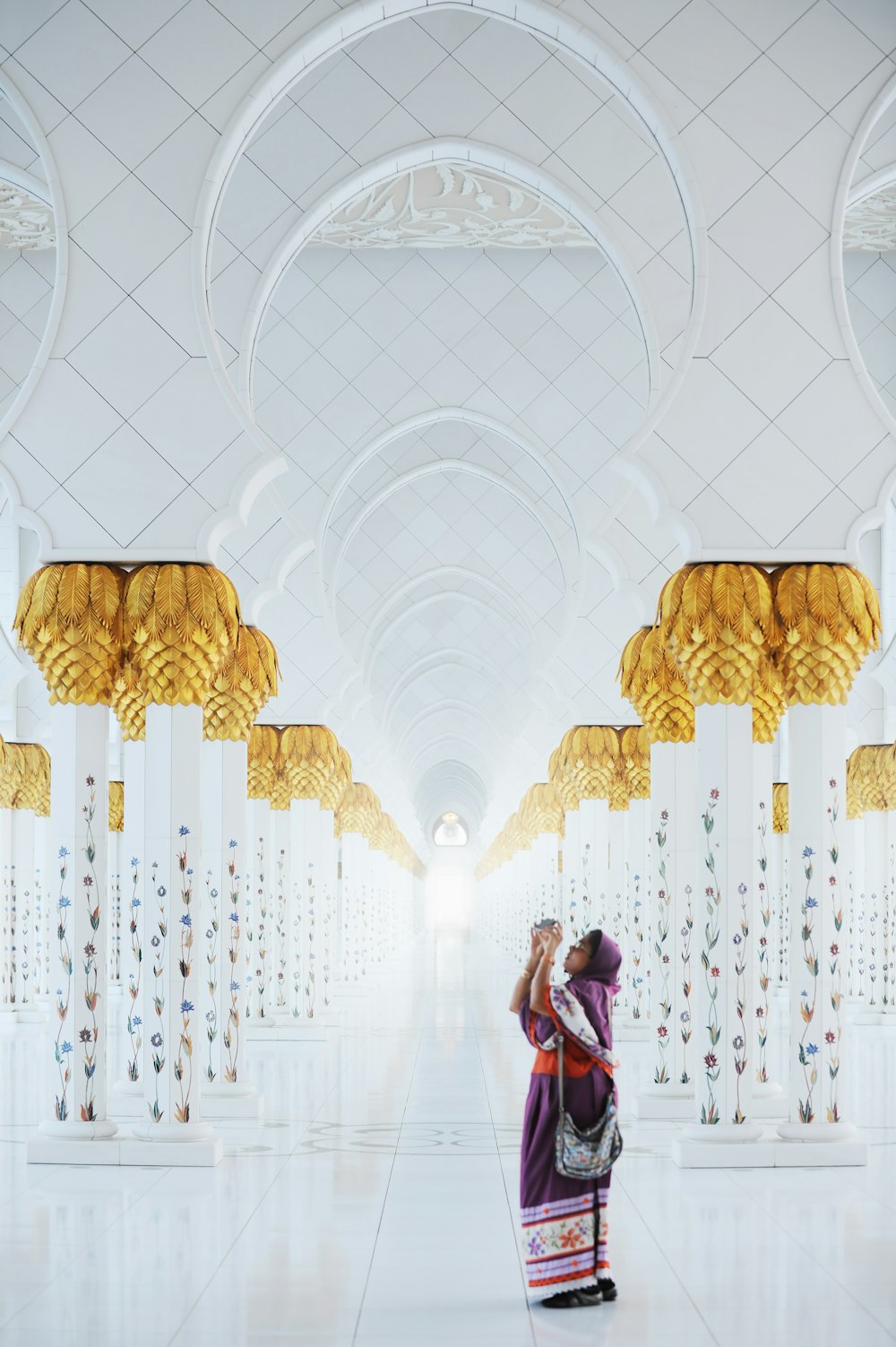 woman standing inside a prayer temple