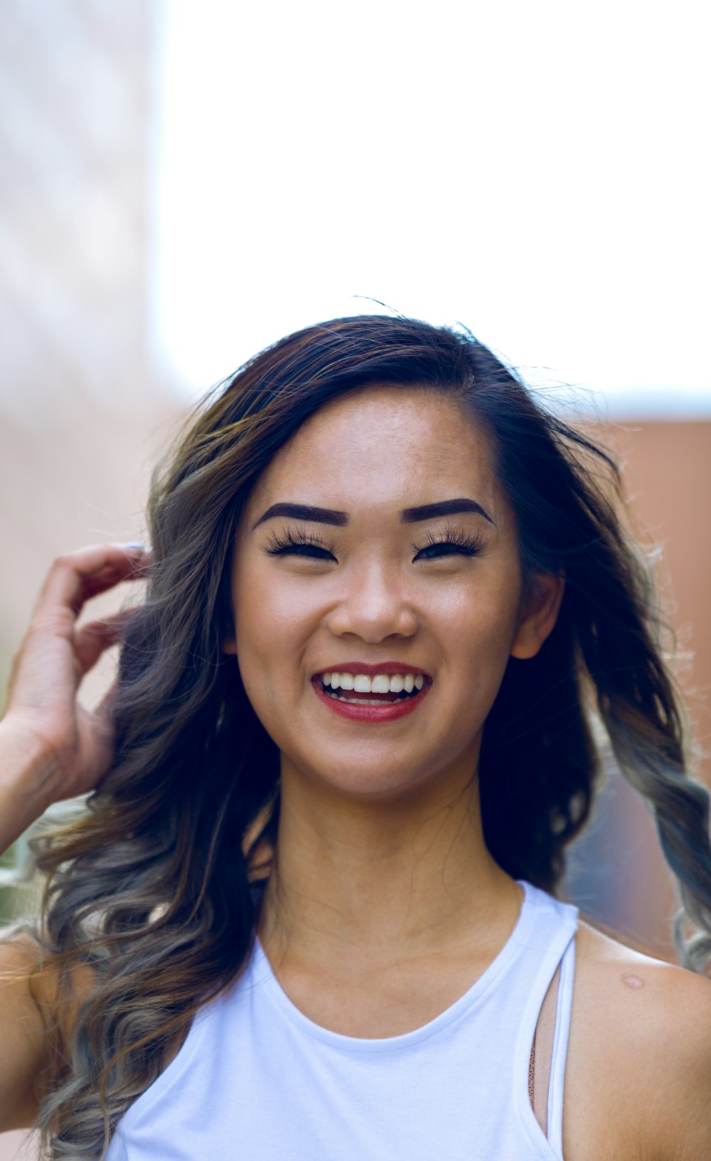 portrait photography of a smiling woman