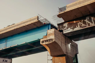 broken brown concrete bridge