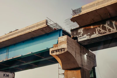 broken brown concrete bridge