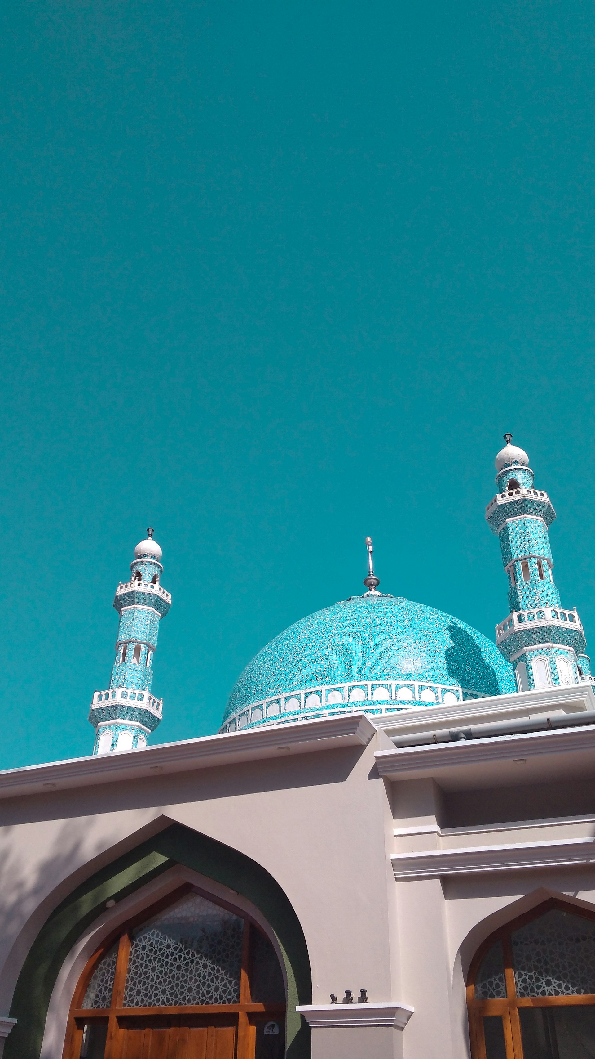 teal and white mosque