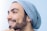 man wears blue knit cap