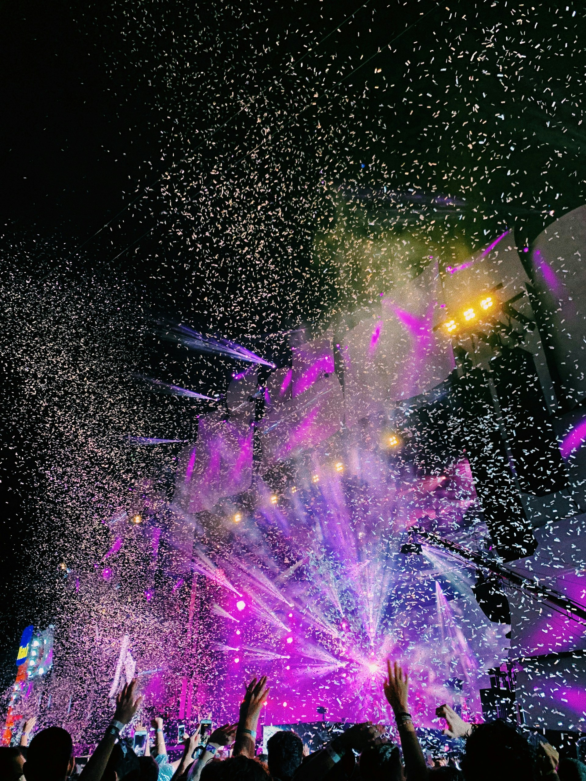woman wearing yellow long-sleeved dress under white clouds and blue sky during daytime