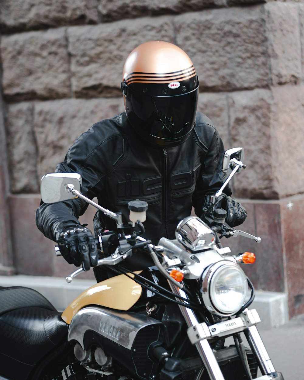 man holding a motorcycle