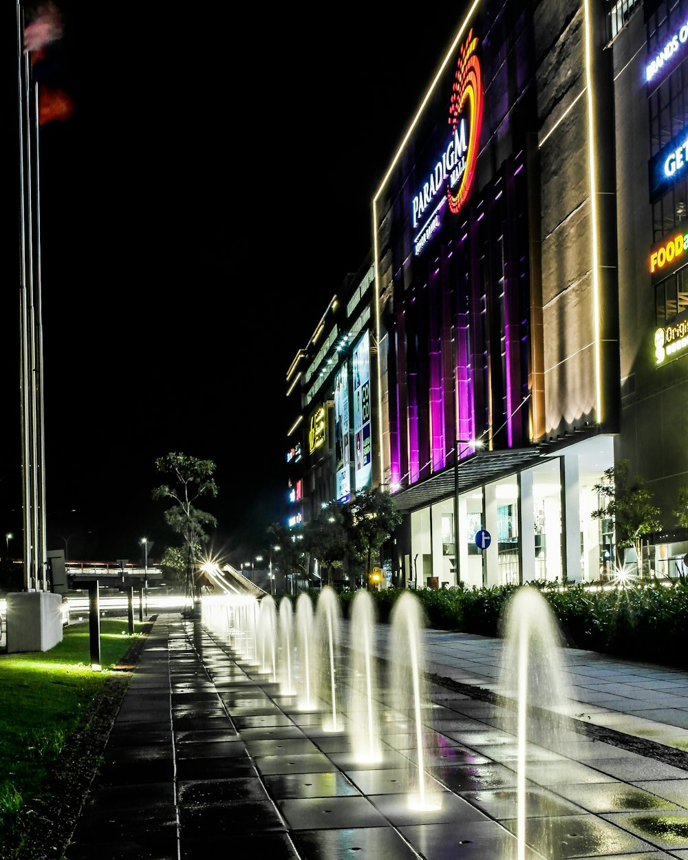 fountains near concrete building