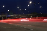 The Wawasan Interchange illuminated at dusk, showcasing smooth highway curves and lighting.