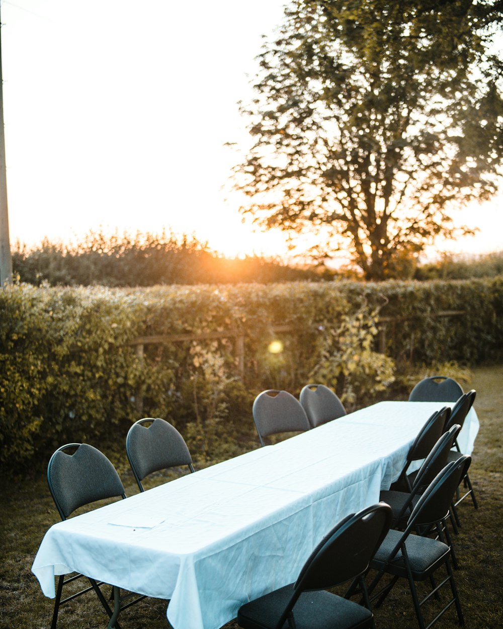 empty white table and black chairs