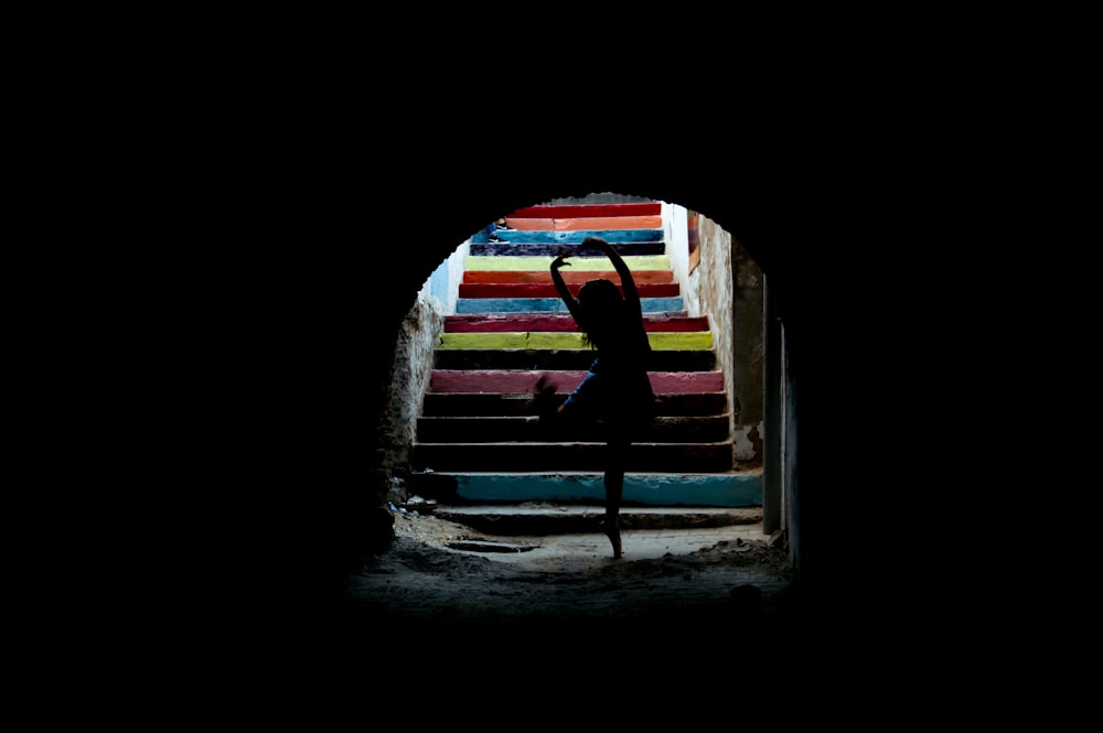 sillhouette of person on stairs