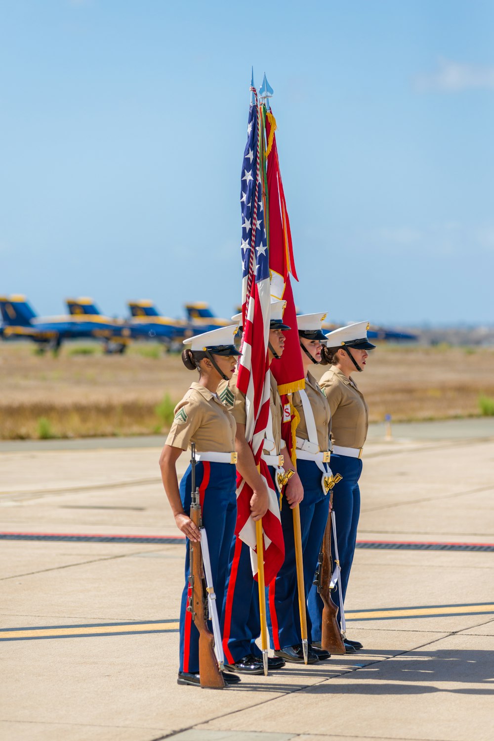 line of women holding flag