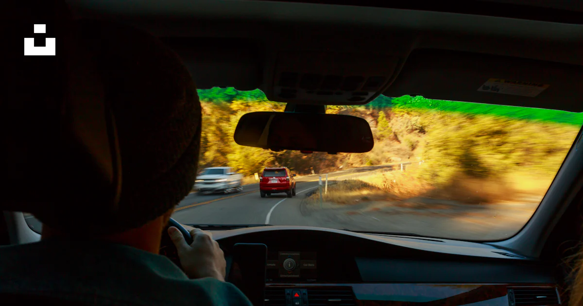 Person sitting insive vehicle photo – Free Road Image on Unsplash
