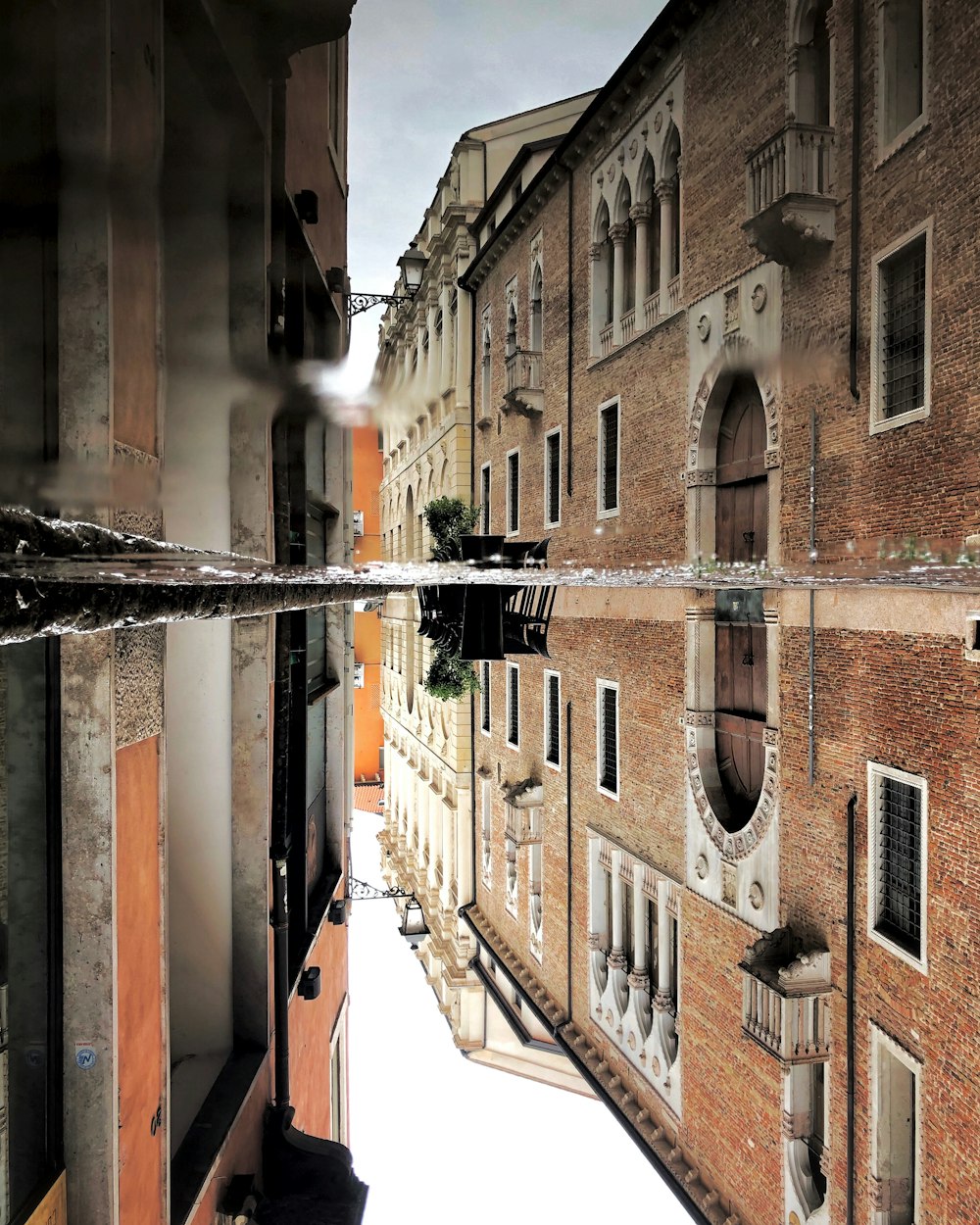 body of water between buildings