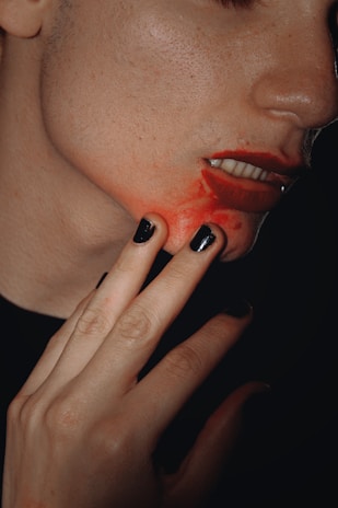 person touching their chin