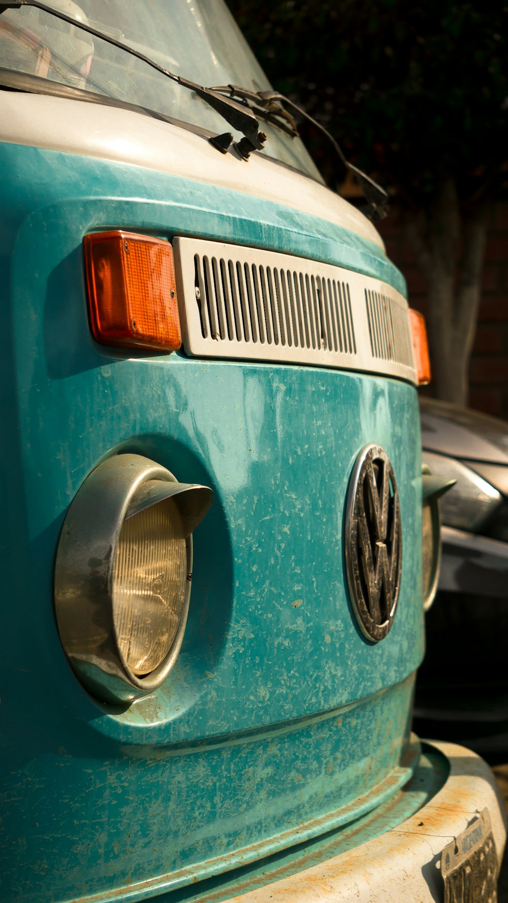 blue and white Volkswagen van