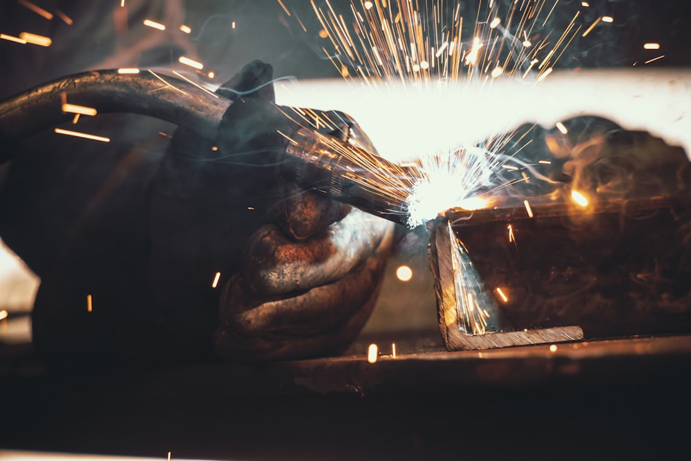 a welder working on a piece of metal