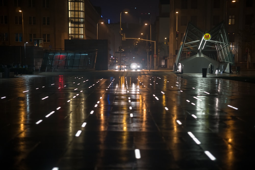 lights reflecting on concrete floor