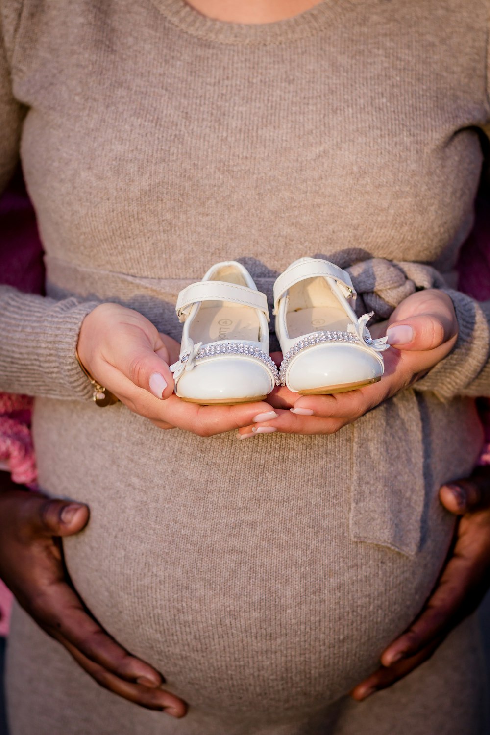 pair of toddler's white Mary Jane shoes