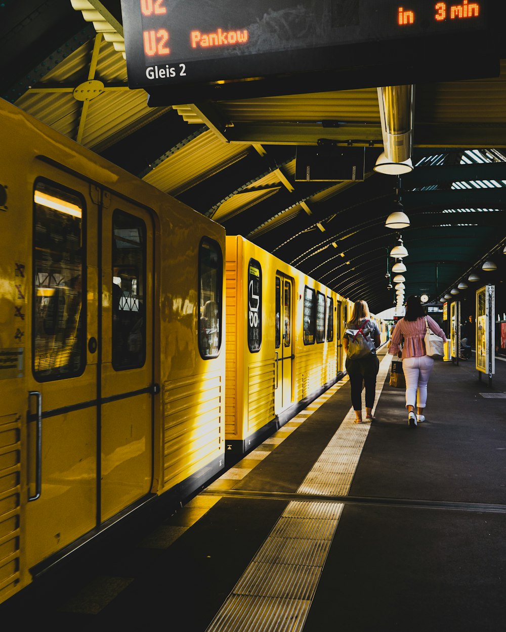 yellow train on focus photography