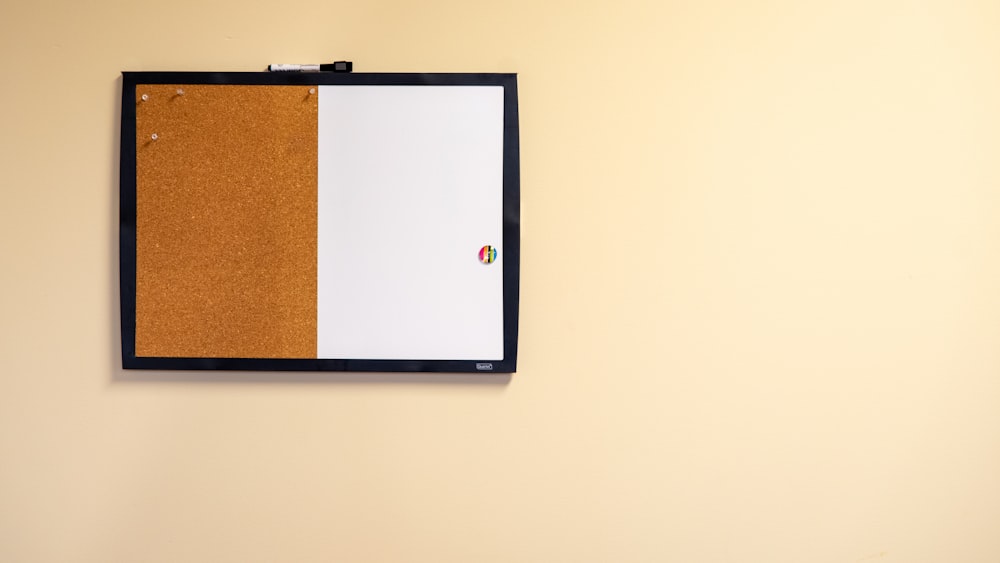 brown and white bulletin board