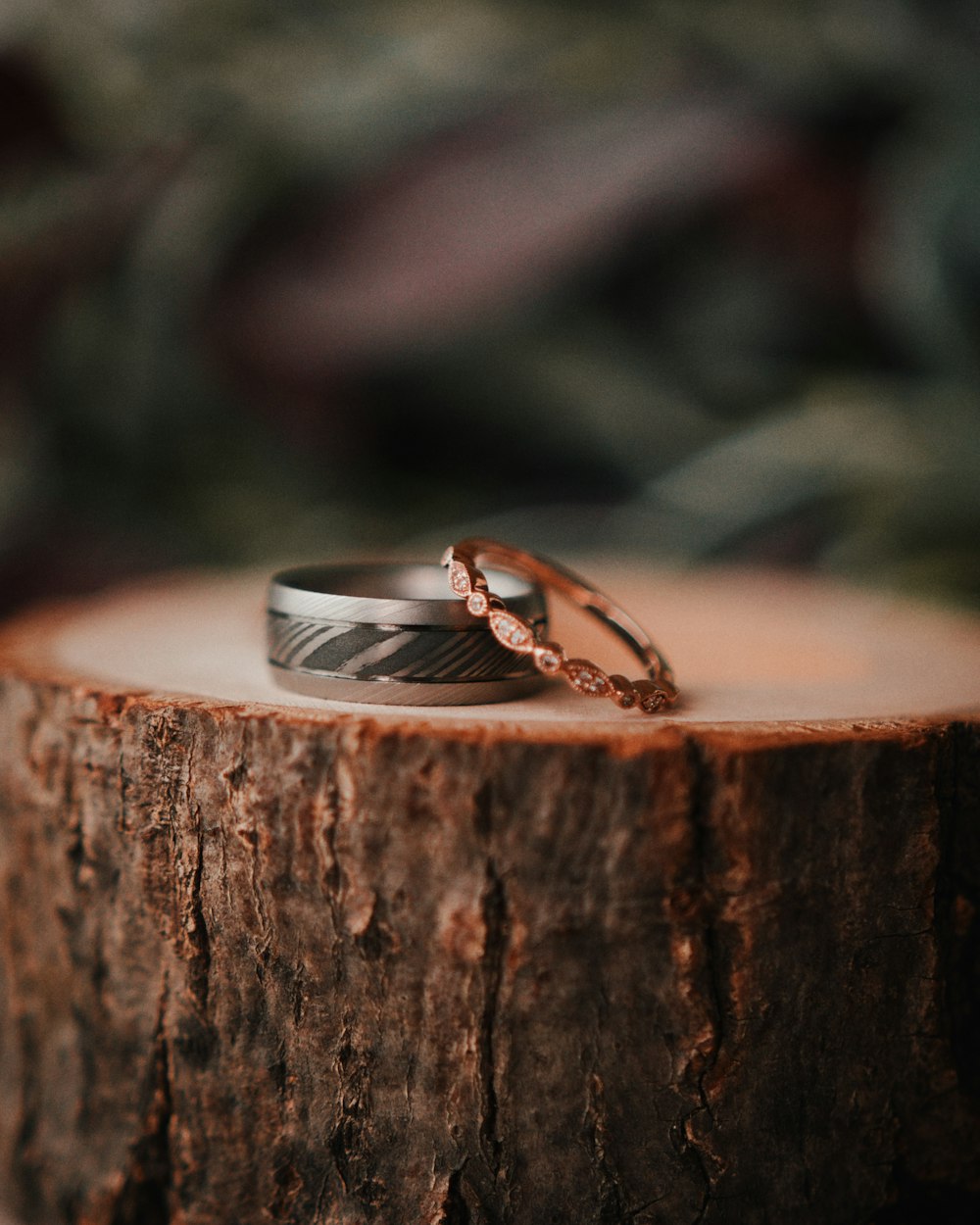 two silver-color and gold-color rings