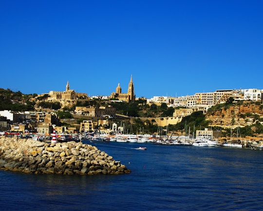 buildings across body of water in Ghanjsielem Malta