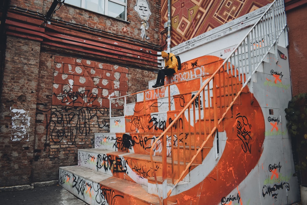 man sitting on stairs