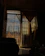 Cozy room featuring a softly lit fabric door curtain from vertafoma.