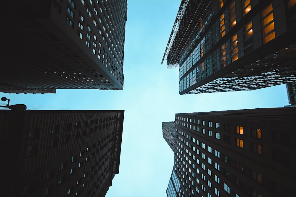 four brown high rise buildings