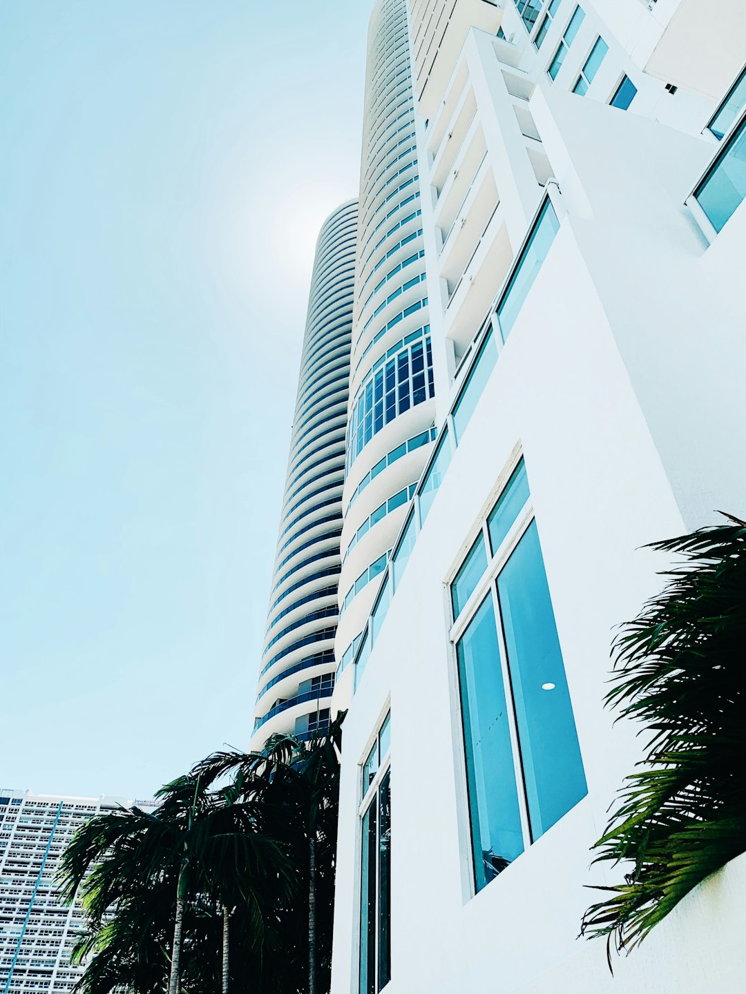 white painted buildings in low-angle view photo