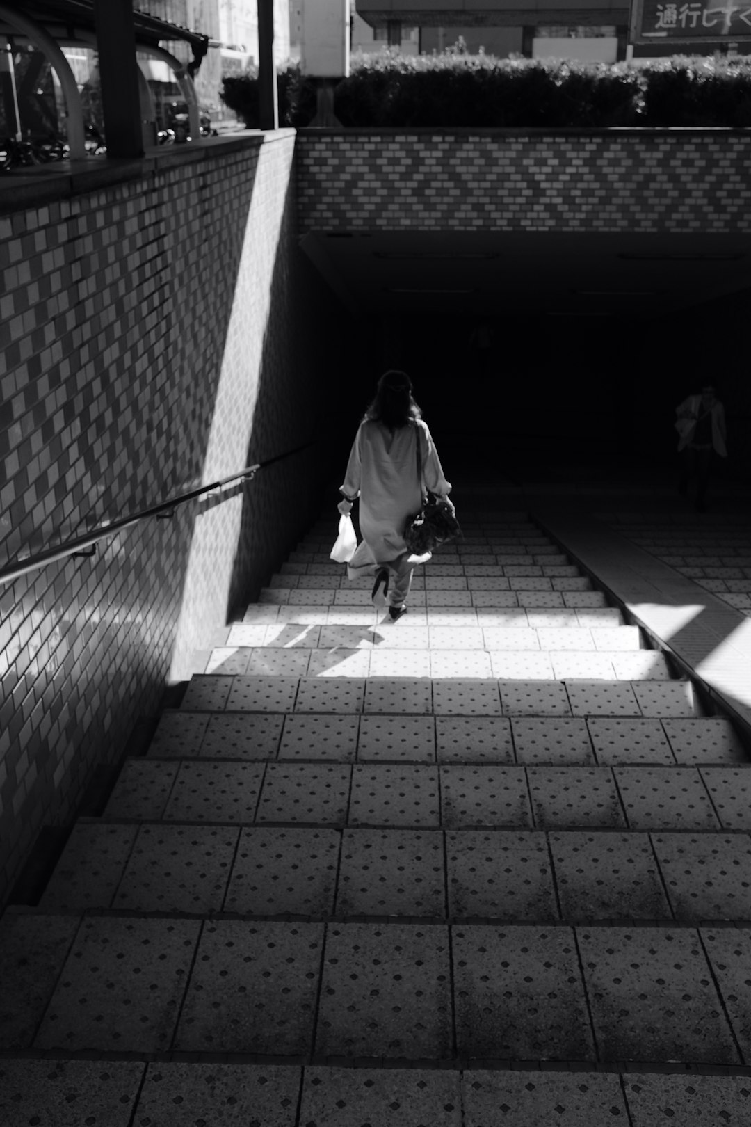 woman walking down on stairs