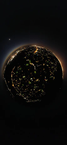 A vibrant 360-degree cityscape view showing streets and buildings with map markers.