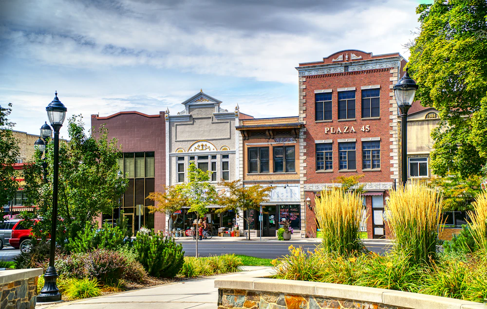 Small-town Main Street storefronts at dusk