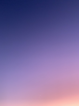 Dramatic orange and red sunset sky over a city skyline silhouette, evoking the fiery glow that engulfed Chicago during the Great Fire of 1871