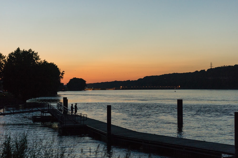 empty wooden dock during blue hour