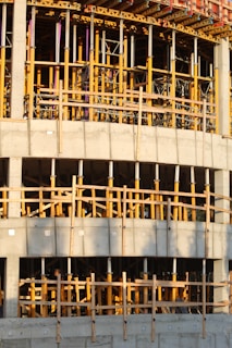 white and brown unfinished building