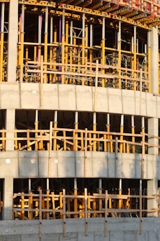 white and brown unfinished building