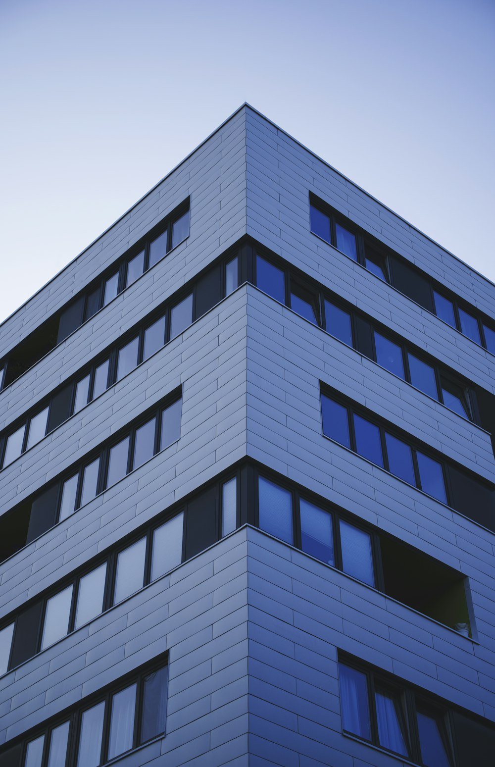 grey concrete highrise building during daytime