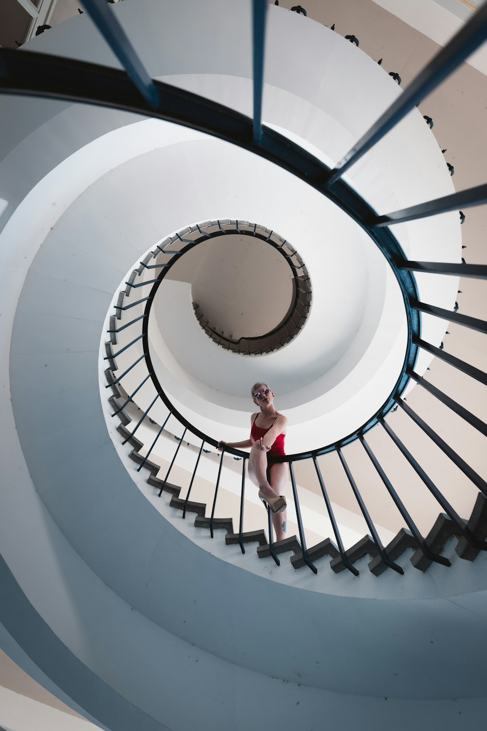 woman standing on stairs