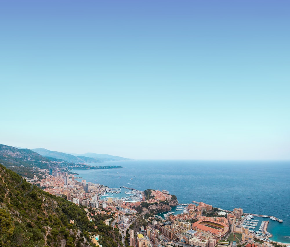 a scenic view of a city on the edge of a cliff