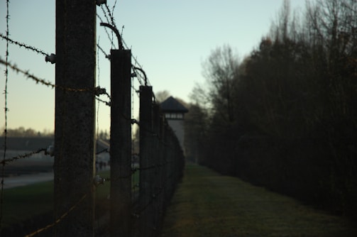 Old Soviet gulag camp with barbed wire fences.