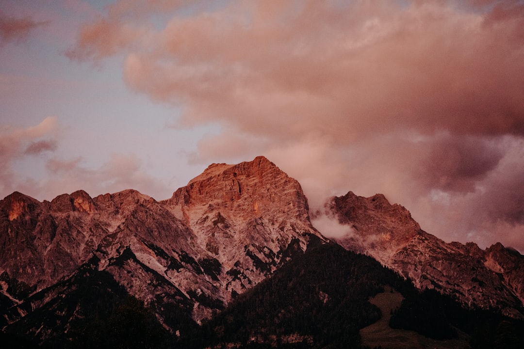 mountains under cloudy sky